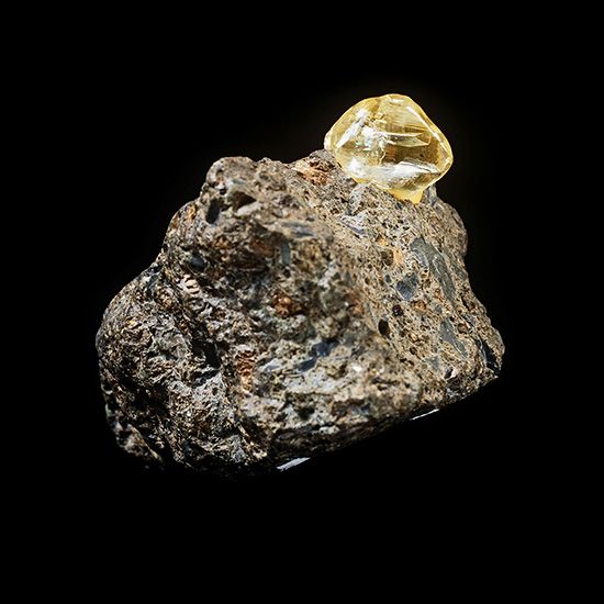 An uncut diamond in rock