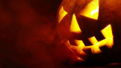 Why do people carve pumpkins for Halloween?